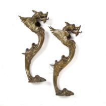 A pair of Victorian brass dragon table Monopodia each with Rn No 75774 50cm high