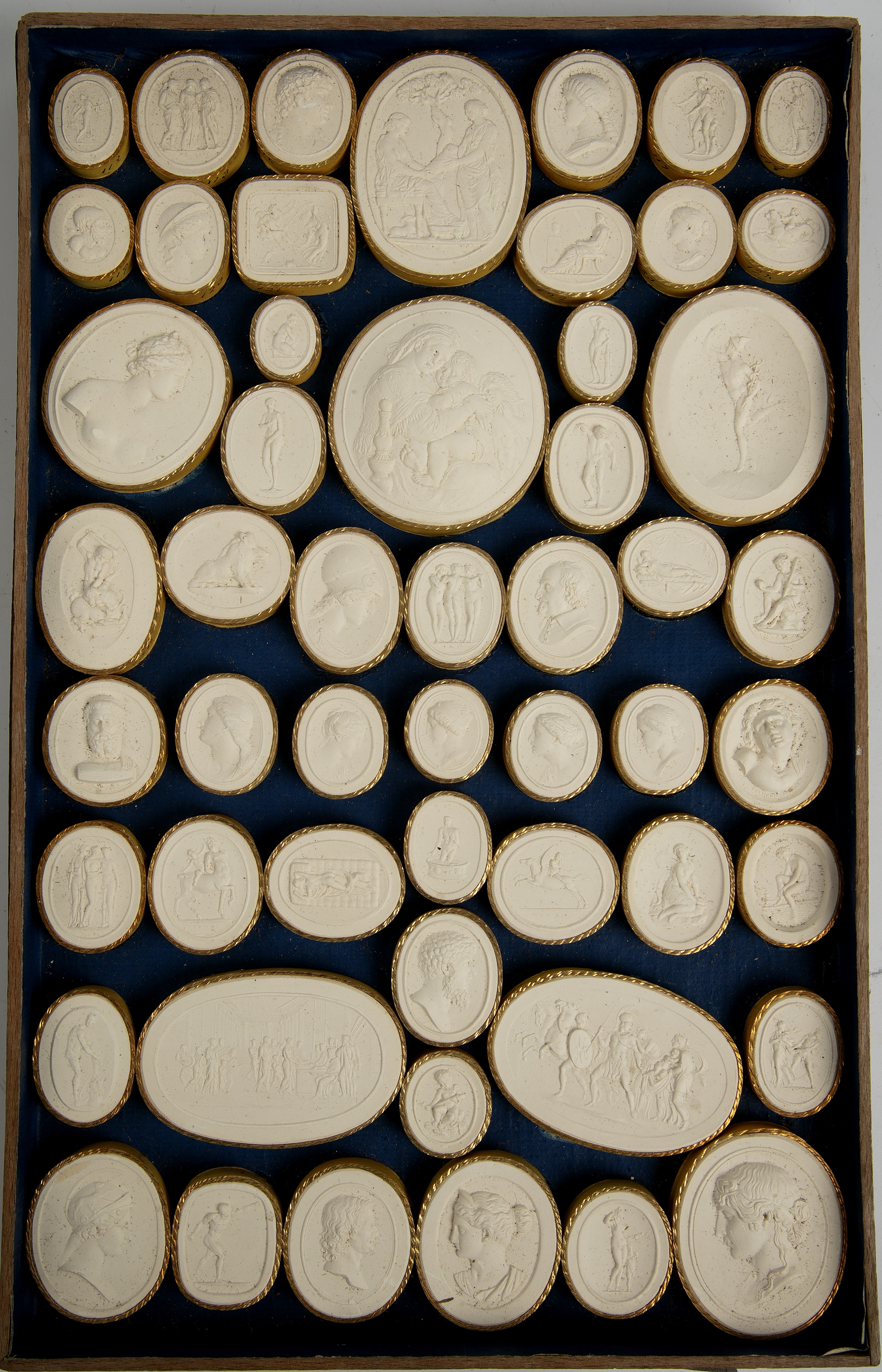 A large collection of Grand Tour plaster relief plaques approximately 400 in wooden trays. - Image 7 of 13