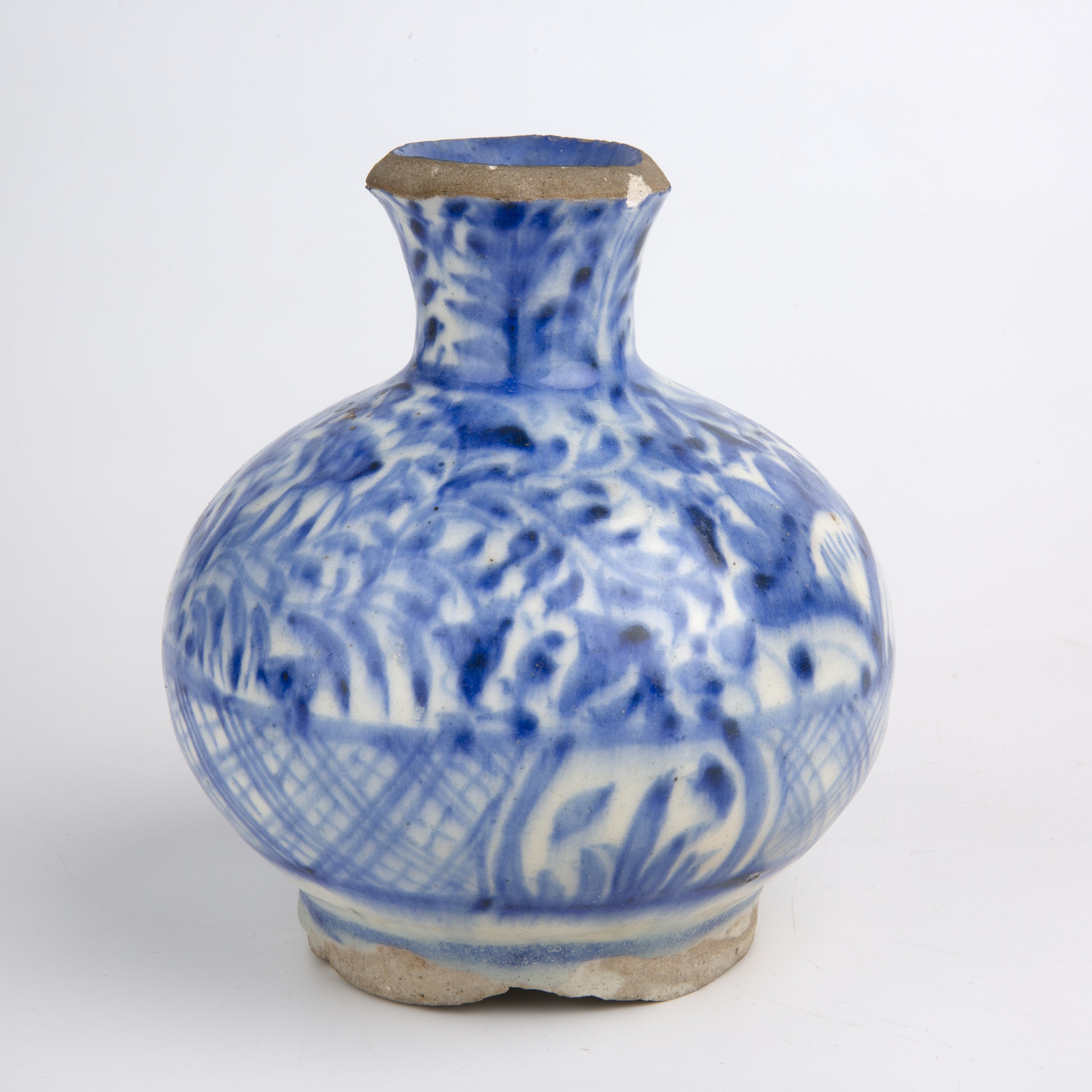 An early 18th century Meshed Kirman pottery bottle vase, with blue and white decoration 14cm wide - Image 3 of 3