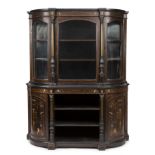 An Edwardian ebonised library cabinet with a glazed bookcase top, pillar supports and inlaid