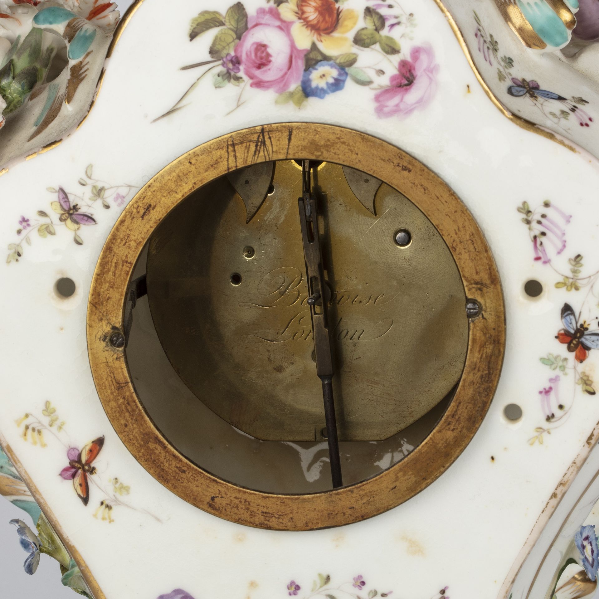 A 19th century porcelain mantel timepiece, the engine turned gilt dial with blue enamel Roman - Image 6 of 9
