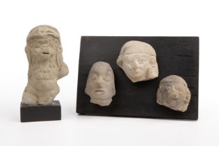 Four pre Columbian pottery heads 6cm x 5cm