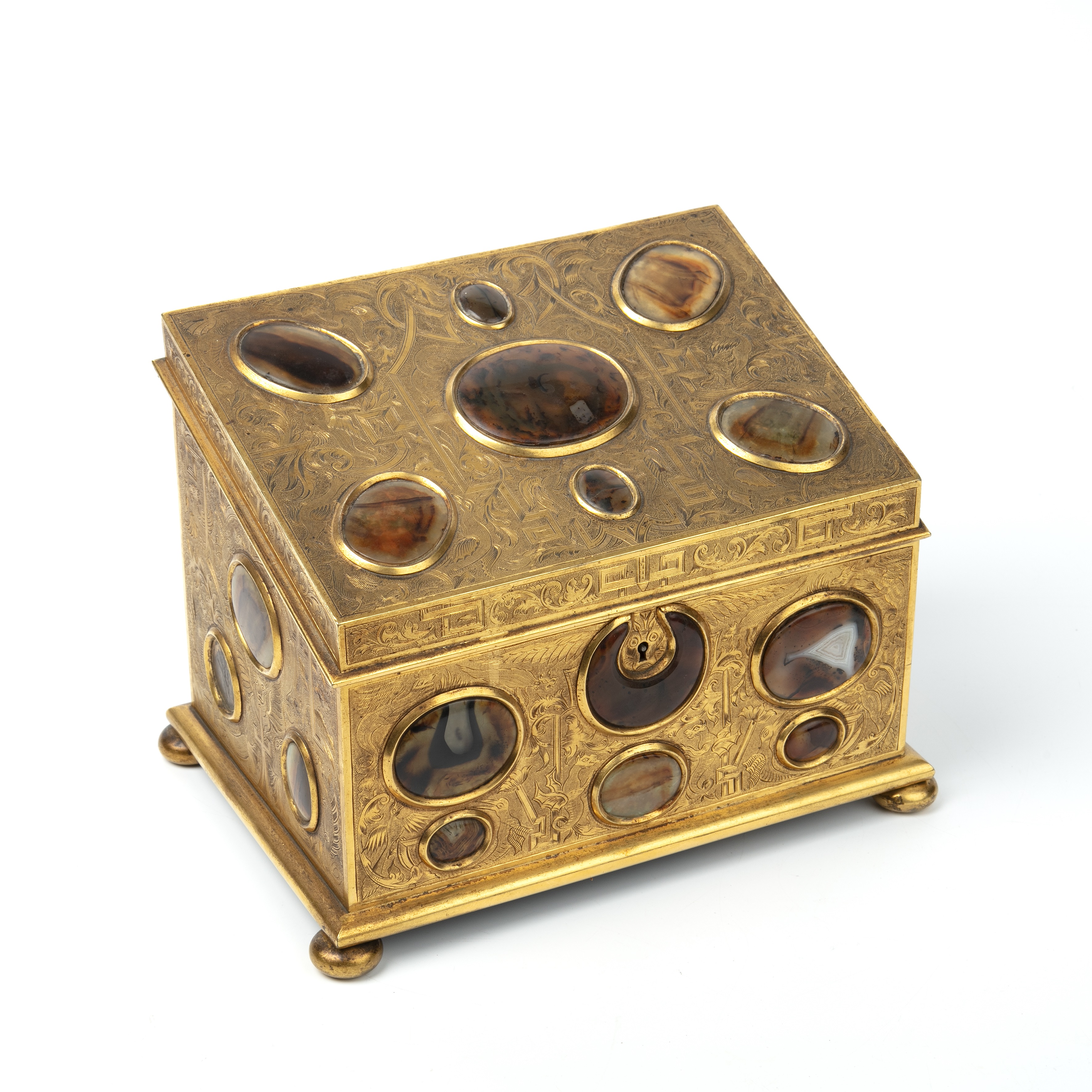 A 19th century correspondence gilt box with engraved decoration and inset cabochon stones hardstones