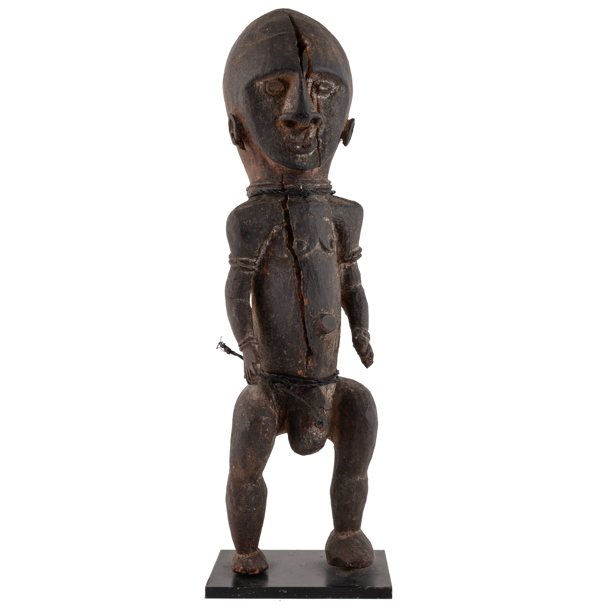 An antique east Sepik, Maprik tribe carved wood figure 9cm wide 32cm high Provenance A private