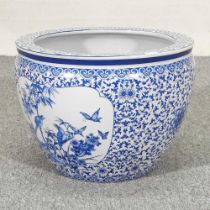 A Chinese porcelain blue and white fish bowl, decorated with birds, 36cm diameter