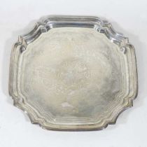 A modern silver salver, of canted square shape, engraved with a central celtic motif, within a