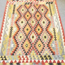 A kilim rug, with coloured diamond pattern, 210 x 150cm