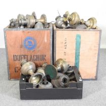 A collection of brass oil lamp fonts