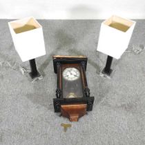 A pair of table lamps, together with a Vienna style clock, 66cm high (3)