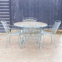 A metal garden table, with a set of four chairs (5)