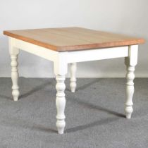 A modern light oak and white painted dining table, on turned legs 122w x 92d x 78h cm