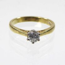 An 18 carat gold solitaire diamond ring, approximately 0.25 carats, 3.1g, size M