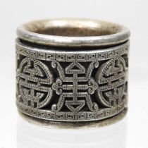 A Chinese white metal archer's ring, of pierced circular shape, 30mm diameter