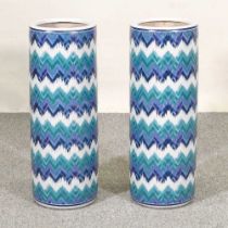 A pair of Chinese porcelain stick stands, with zig zag decoration, 60cm high (2)