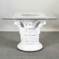 An Italian painted plaster centre table, by Sergio Leoni, having a shaped glass top, on a Corinthian