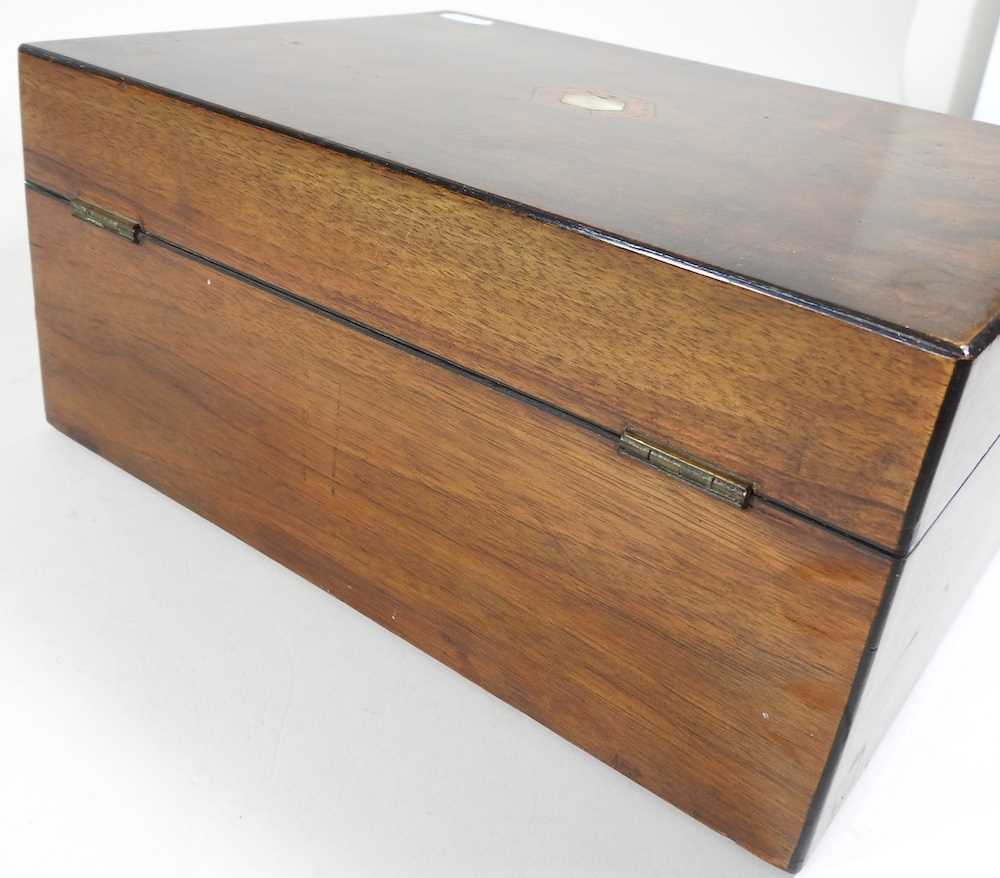 A 19th century walnut workbox, 29cm wide, containing sewing related items 30w x 22d x 14h cm - Image 7 of 7
