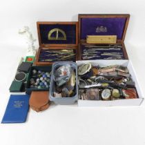 A collection of rock samples, costume jewellery, coins, drawing sets and other items