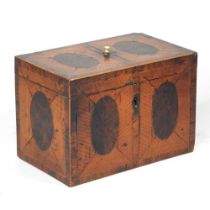 A George III satinwood and yew tea caddy, with a fitted interior, 18cm wide. Note: a non-