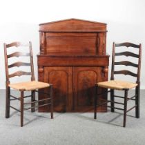 A Victorian mahogany chiffonier, together with a pair of rush seated ladder back dining chairs (3)