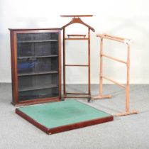 An early 20th century glazed hanging cabinet, together with a valet stand, towel airer and a card