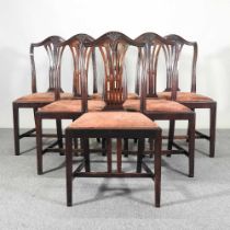 A set of six early 20th century mahogany dining chairs, with leather seats