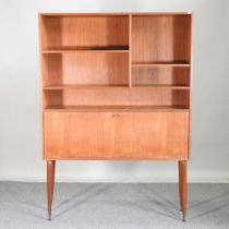 A 1970's teak secretaire bookcase 122w x 29d x 173h cm