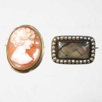 A George III seed pearl mourning brooch, inset with plaited hair, inscribed Francis Hicks, died 2