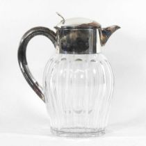 An early 20th century continental silver plated and glass lemonade jug, 27cm high