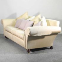 A modern cream upholstered Duresta sofa, on turned legs, with loose cushions 237w x 101d x 83h cm