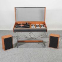 A vintage DeccaSound record player, with speakers and records 77w x 36d x 62h cm