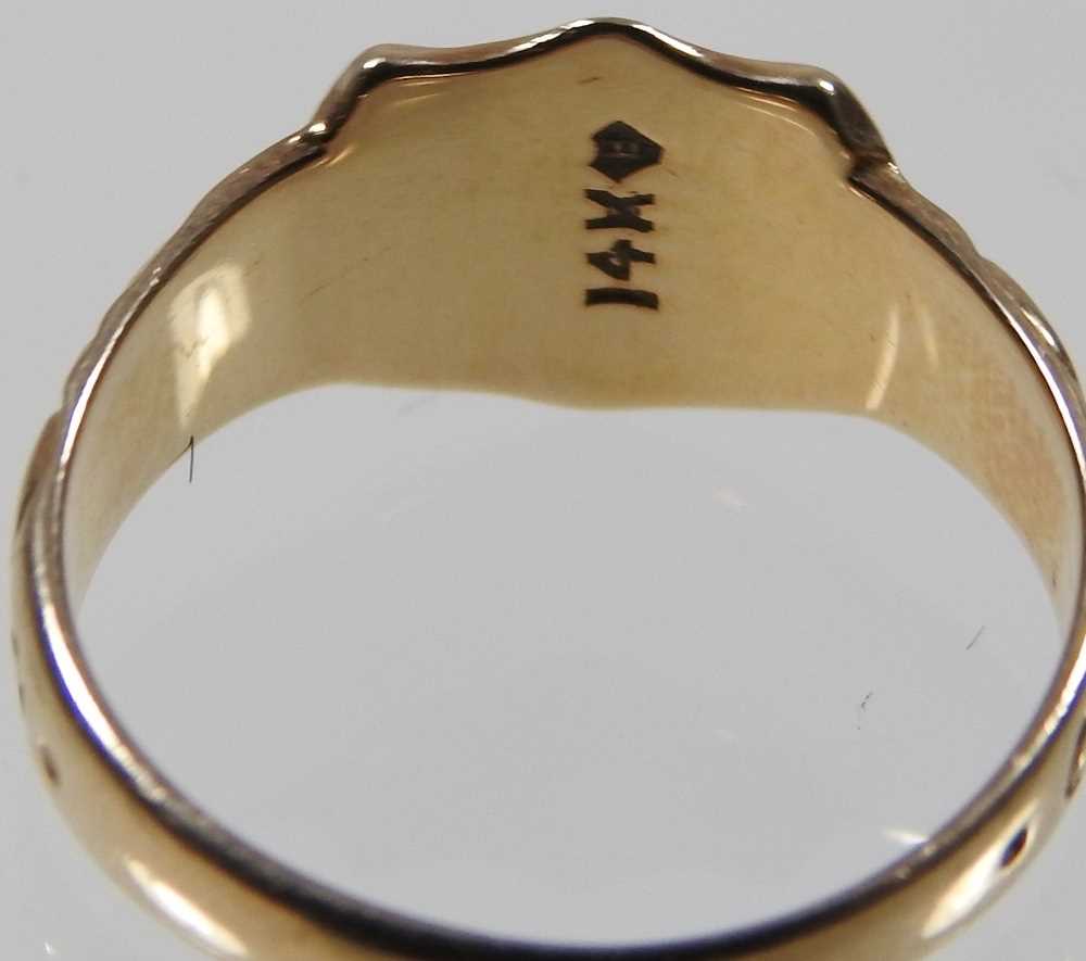 A 9 carat gold signet ring, the central shield engraved with initials, flanked by scrolled - Image 4 of 5