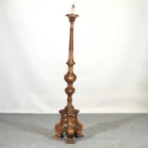 A large Italian style carved gilt wood standard lamp, 178cm high