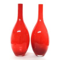 A pair of tall modern orange glass vases, 70cm high (2)