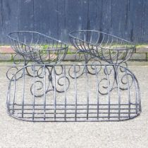 A pair of painted metal garden troughs, 74cm wide, together with another (3)