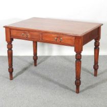 An early 20th century pine writing table, on turned legs 107w x 76d x 73h cm