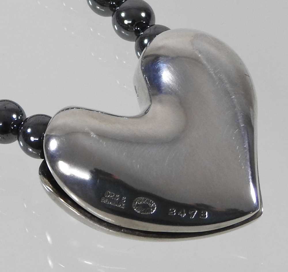 A Danish hematite bead necklace, with a removable silver heart pendant, designed by Allan Schaff for - Image 4 of 7