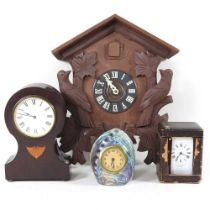 An Edwardian inlaid balloon shaped mantel clock, 22cm high, together with an early 20th century