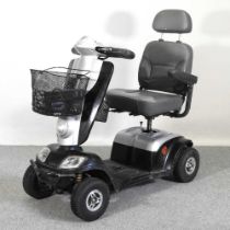 A silver electric mobility scooter, with charger Working condition