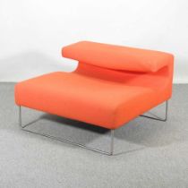 A contemporary low seat lounge chair, designed by Patricia Urquiola, for Moroso, with an orange