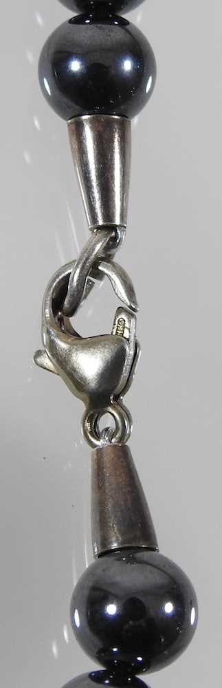 A Danish hematite bead necklace, with a removable silver heart pendant, designed by Allan Schaff for - Image 5 of 7