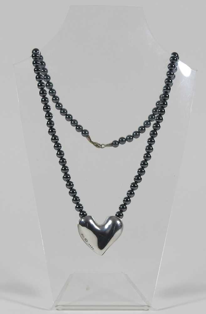 A Danish hematite bead necklace, with a removable silver heart pendant, designed by Allan Schaff for - Image 2 of 7