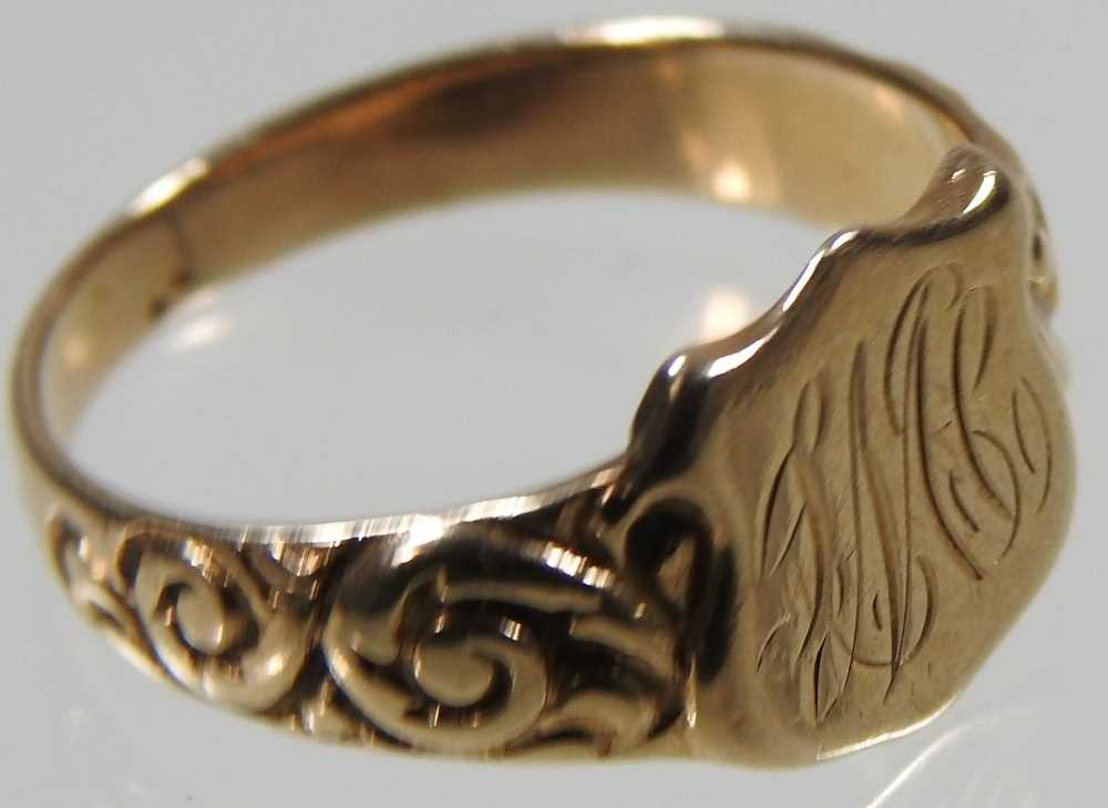 A 9 carat gold signet ring, the central shield engraved with initials, flanked by scrolled - Image 5 of 5