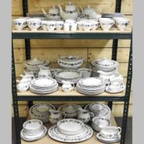 An extensive Royal Doulton Burgundy pattern tea and dinner service, to include tureens