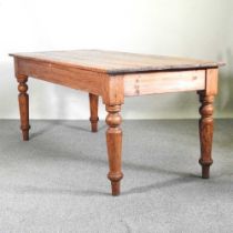 An antique pine dining table, on turned legs 183w x 84d x 76h cm Overall condition is complete and