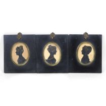 English school, 19th century, three miniature silhouette portraits, each of a young lady in profile,