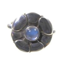 A silver Georg Jensen Moonlight Blossom ring, set with a cabochon moonstone, stamped marks and