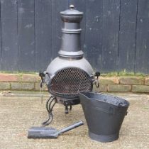 A metal chiminea, 91cm high, together with a coal bucket (2)