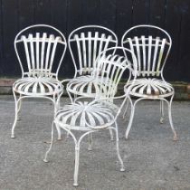 A set of four cream painted metal garden chairs (4) These are solid and usable. They are rusted