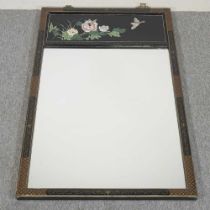 A Chinese ebonised wall mirror, 20th century, with oriental decoration, 66 x 107cm