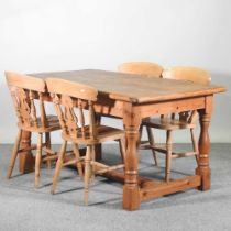 A pine dining table, together with a set of four beech chairs (5) 150w x 91d x 78h cm